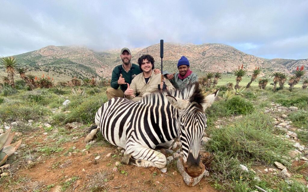 WhatsApp Image 2025-01-29 at 08.33.18 Hunter's posing with Zebra