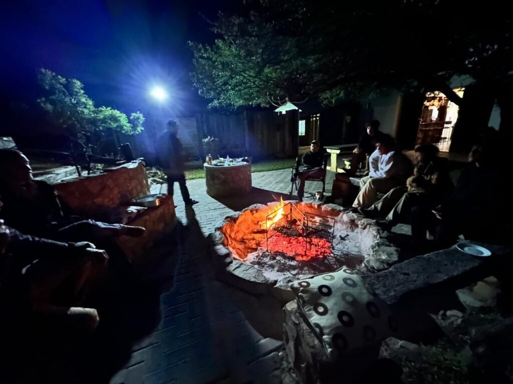 People gathered around a braai