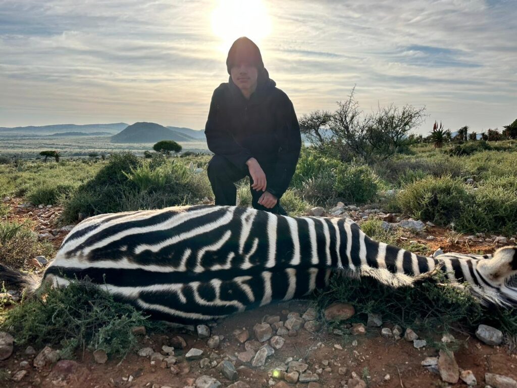 WhatsApp Image 2025-01-29 at 08.33.20 (1) Hunter posing with Zebra